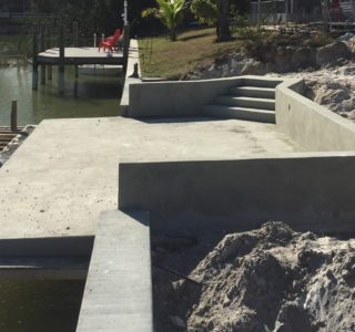 Completed patio dock at edge of seawall.